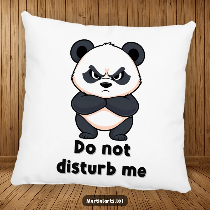 Funny panda pillow featuring a determined panda with crossed arms and fierce eyes, providing humorous comfort and protection.