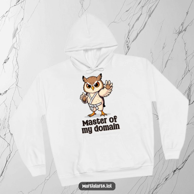 Funny owl hoodie showing a proud bird in a graceful karate pose, offering warmth and martial arts inspiration.