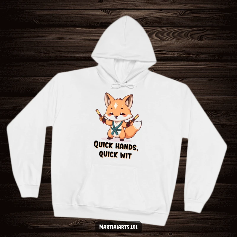 Funny Fox Nunchuck Hoodie: A curious, sly fox juggling miniature nunchucks, perfect for staying warm and stylish.