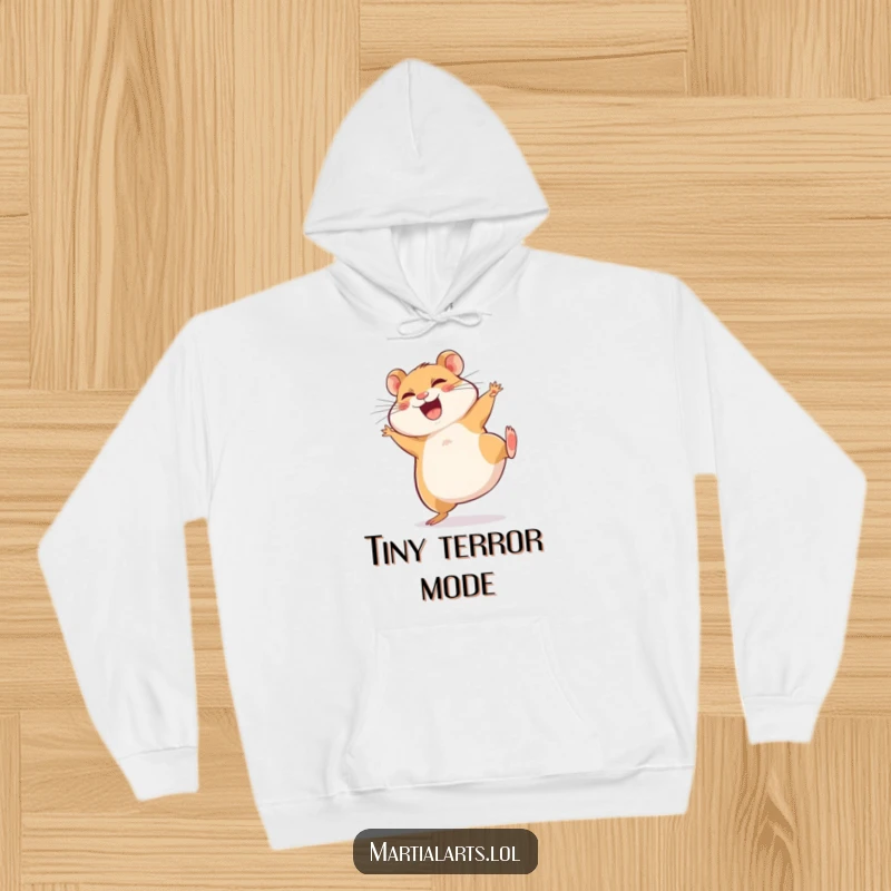 Funny Hoodie: A happy, giggling hamster attempts a funny, spinning side kick, radiating pure amusement and warmth.